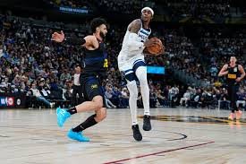 Jamal Murray with his Denver Nuggets teammates showing unity