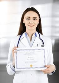 Doctor holding up medical certification proudly in clinic office